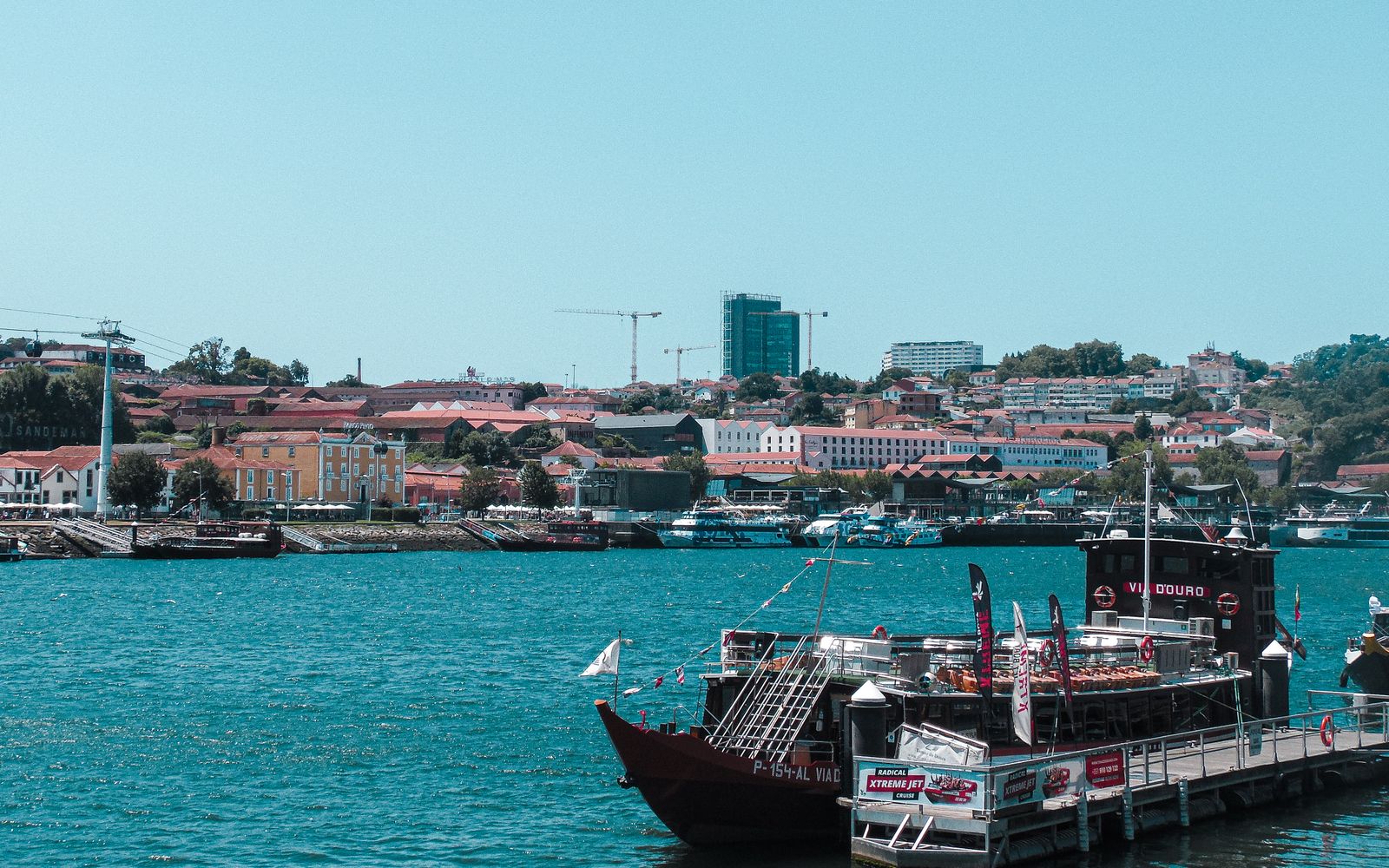 Porto's Ribeira waterfront and traditional boats on the Douro River