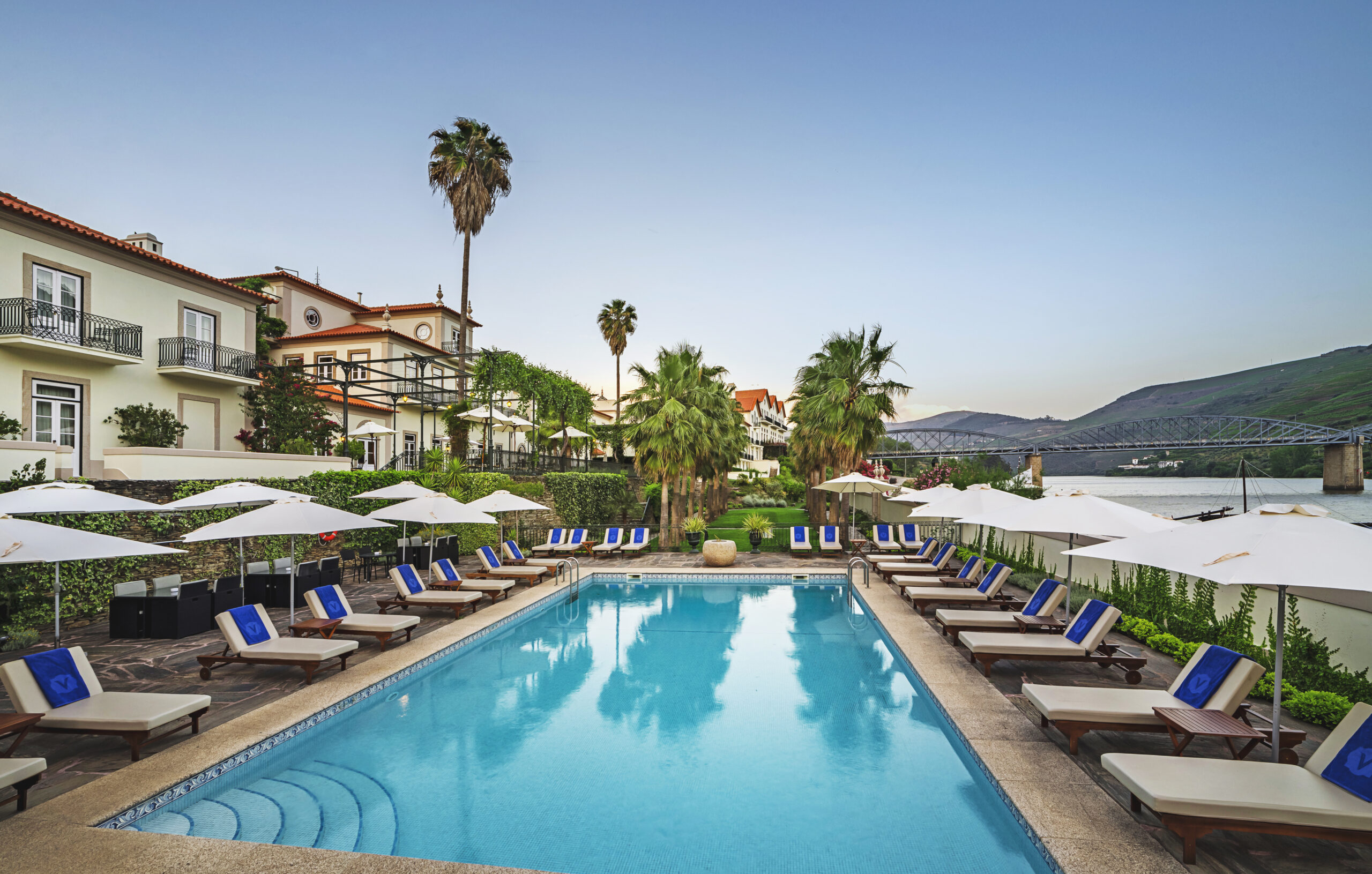 The Vintage House hotel and swimming pool beside the Douro River in Pinhão