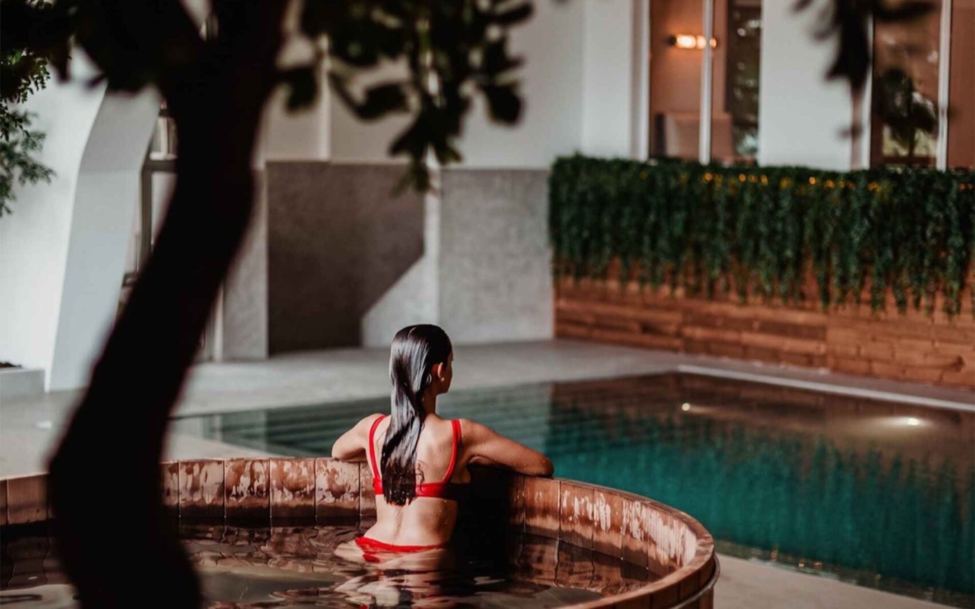 Guest relaxing in the indoor spa pools at Lamego Hotel and Life