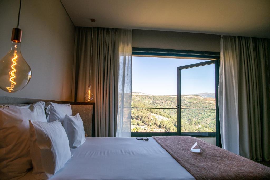 Bedroom at MW Douro Wine and Spa overlooking the valley