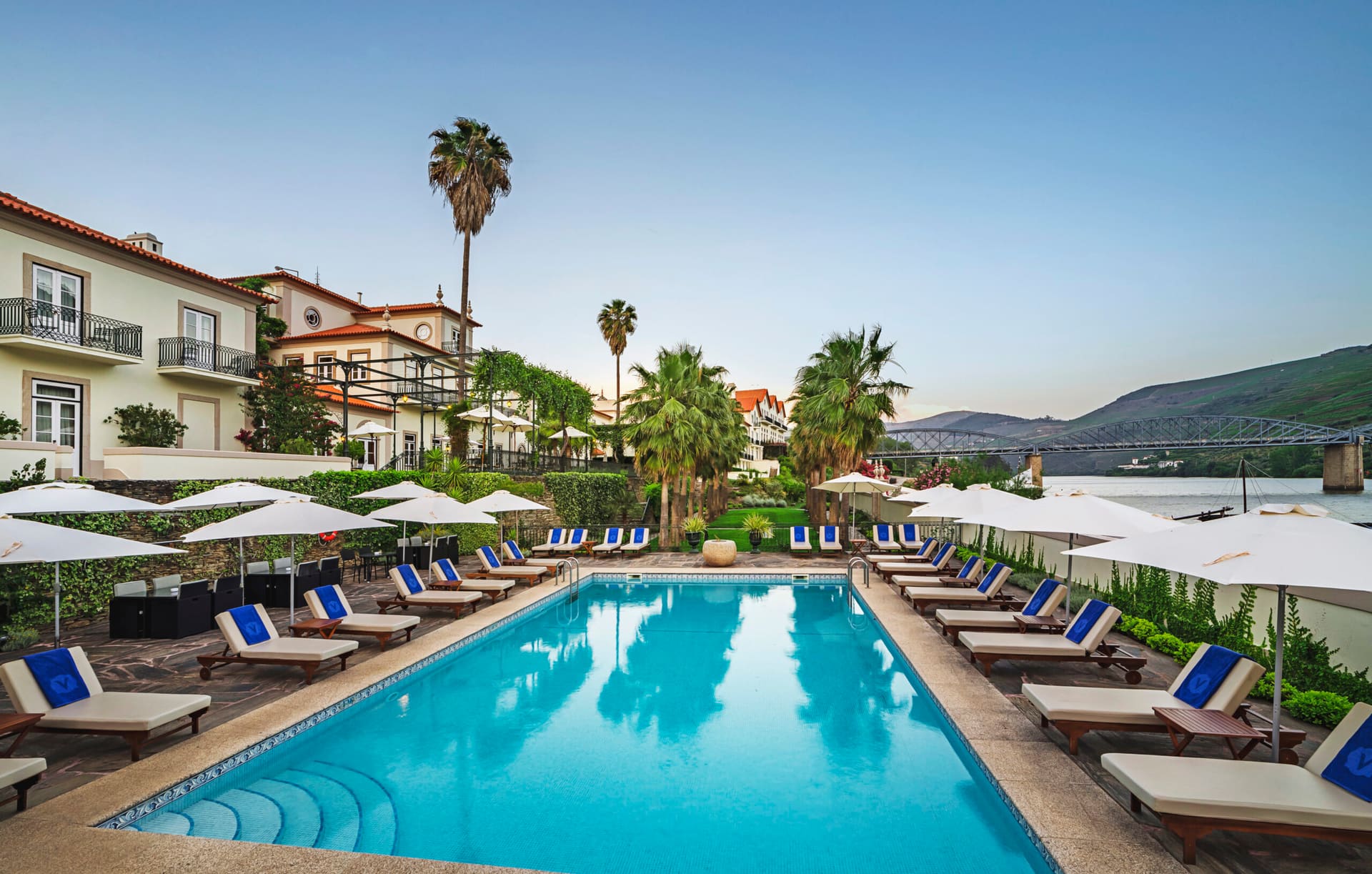 The Vintage House hotel and swimming pool beside the Douro River in Pinhão